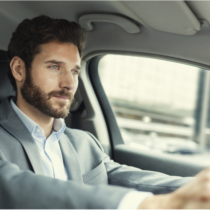 Man in a car driving